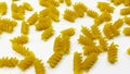 Pasta in the shape of a spiral. Macro photo of pasta. Pasta background. Pasta in bulk Royalty Free Stock Photo