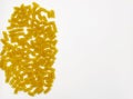 Pasta in the shape of a spiral. Macro photo of pasta. Pasta background. Pasta in bulk Royalty Free Stock Photo