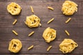 Pasta shapes collection on a wooden background Royalty Free Stock Photo