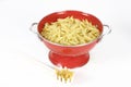 Pasta shells in colander