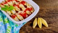 Pasta shells stuffed with cheese and mushroom, sprinkled with parmesan cheese Royalty Free Stock Photo