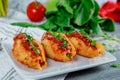 Pasta shells stuffed with ricotta cheeses, tomato sauce and chives Royalty Free Stock Photo