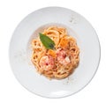 Pasta with shrimp, salmon, a plate, top, tomato paste Royalty Free Stock Photo