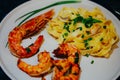Pasta with shrimps and langustine. Seafood. Home cooking. Royalty Free Stock Photo