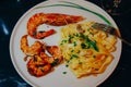 Pasta with shrimps and langustine. Seafood. Home cooking. Royalty Free Stock Photo