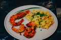 Pasta with shrimps and langustine. Seafood. Home cooking. Royalty Free Stock Photo