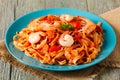 Pasta with prawns, tomatoes, and herbs. Royalty Free Stock Photo