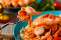 Pasta with prawns, tomatoes, and herbs. Royalty Free Stock Photo