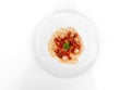 Pasta, Spaghetti bolognese served on a white plate and tomato sauce Royalty Free Stock Photo
