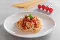 Pasta, Spaghetti bolognese served on a white plate and tomato sauce Royalty Free Stock Photo