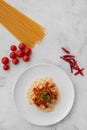 Pasta, Spaghetti bolognese served on a white plate and tomato sauce Royalty Free Stock Photo