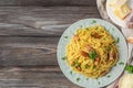 Pasta spaghetti carbonara with pancetta, bacon, egg, parmesan cheese on wooden background. top view Royalty Free Stock Photo