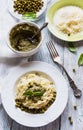 Pasta spaghetti green beans, sauce pesto, parmesan, fresh basil. Vintage plates, wooden table, top view Royalty Free Stock Photo