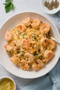 Pasta spaghetti with grilled shrimps bechamel sauce. Spaghetti with seafood rich cream top view Royalty Free Stock Photo