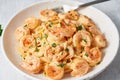 Pasta spaghetti with grilled shrimps bechamel sauce. Spaghetti with seafood rich cream. Royalty Free Stock Photo