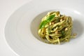 Pasta spaghetti with pesto genovese on white background Royalty Free Stock Photo