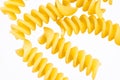 Pasta, spaghetti, shells, rings, bows on a black or white background top view