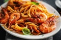 Pasta spaghetti with tomato sauce and shrimps