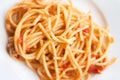 Pasta spaghetti with tomato sauce on white plate  background top view Royalty Free Stock Photo