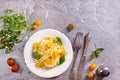 Pasta spaghetti with tomatoes and fresh basil in a plate Royalty Free Stock Photo