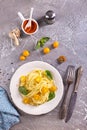 Pasta spaghetti with tomatoes and fresh basil in a plate Royalty Free Stock Photo