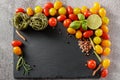 Pasta spinach tagliatelle, lemon and multicolored cherry tomatoes