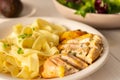 Pasta with stewed chicken breast close up Royalty Free Stock Photo