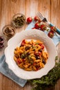 pasta with sword fish tomato black olives Royalty Free Stock Photo