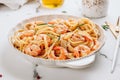 Pasta tagliatelle with shrimps in creamy sauce