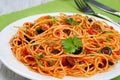 Pasta with tomato, capers, anchovy and olives