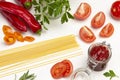 Pasta and tomato halves. Tomato sauce in jar Royalty Free Stock Photo