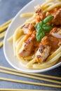 Pasta with tomato sauce and chicken breast