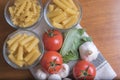 Pasta with tomatoes, basil, garlic and mushrooms Royalty Free Stock Photo