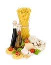Pasta, tomatoes, basil, olive oil, vinegar, garlic and parmesan Royalty Free Stock Photo