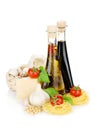 Pasta, tomatoes, basil, olive oil, vinegar, garlic and parmesan Royalty Free Stock Photo