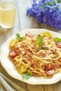 Pasta with tomatoes, ham, capers and cheese Royalty Free Stock Photo