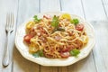 Pasta with tomatoes, ham, capers and cheese Royalty Free Stock Photo