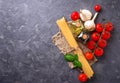 Pasta, tomatoes, olive oil and vinegar Royalty Free Stock Photo