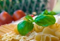 pasta,tomatos,basil,parmesan,knife