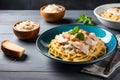 Pasta topped with chicken and cheese - AI Generated