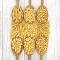 Pasta Varieties In Oak Wood Spoons Royalty Free Stock Photo