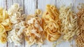 Pasta. Various kinds of uncooked pasta and noodles over stone background, top view with copy space for text. Italian Royalty Free Stock Photo