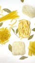Pasta. Various kinds of uncooked pasta and noodles on a white table background, top view flat lay.