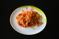 Pasta with vegetable sauce on a white porcelain plate Royalty Free Stock Photo