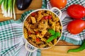 Pasta with vegetable sauce on wooden background Royalty Free Stock Photo