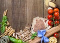 Pasta, vegetables and herbs on wood Royalty Free Stock Photo