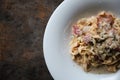 Pasta white sauce with bacon and mushroom in mystic light