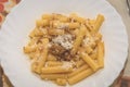 Pasta Ziti Alla Genovese With Grated Grana Padano Cheese