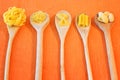 Variety of dry raw pastas over red background Royalty Free Stock Photo