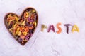 Pasted from pasta word, plate-heart Royalty Free Stock Photo